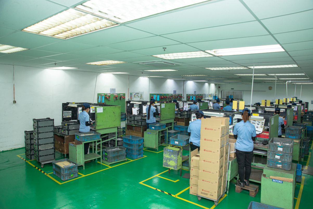 Wide view of Soritsu production floor with operators at work
